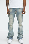 Ripped And Bleach Splatter Stacked Slim Flare Jeans - Light Blue Wash image 1