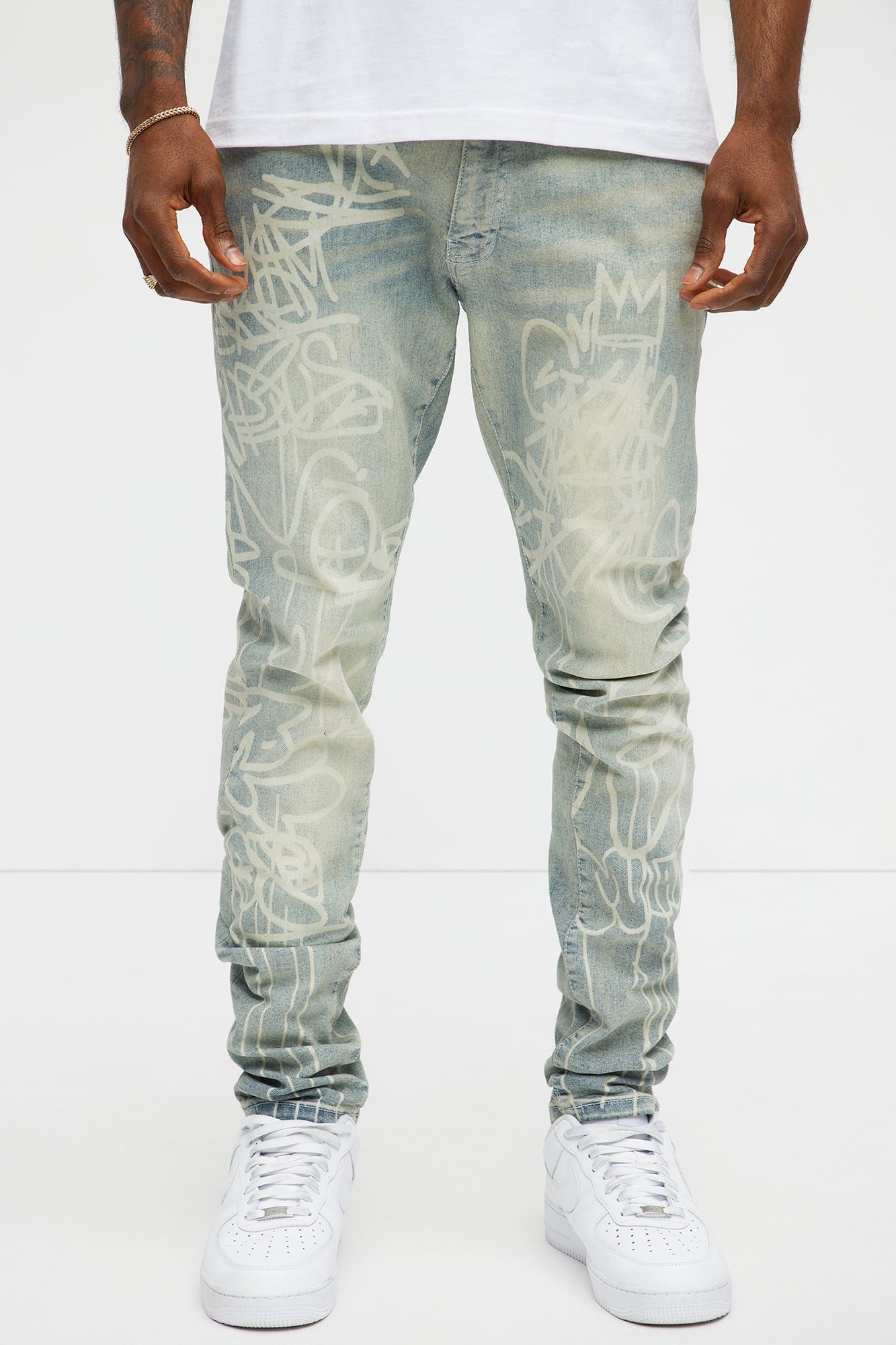 Graffiti Art Stacked Skinny Jeans - Light Wash image 1