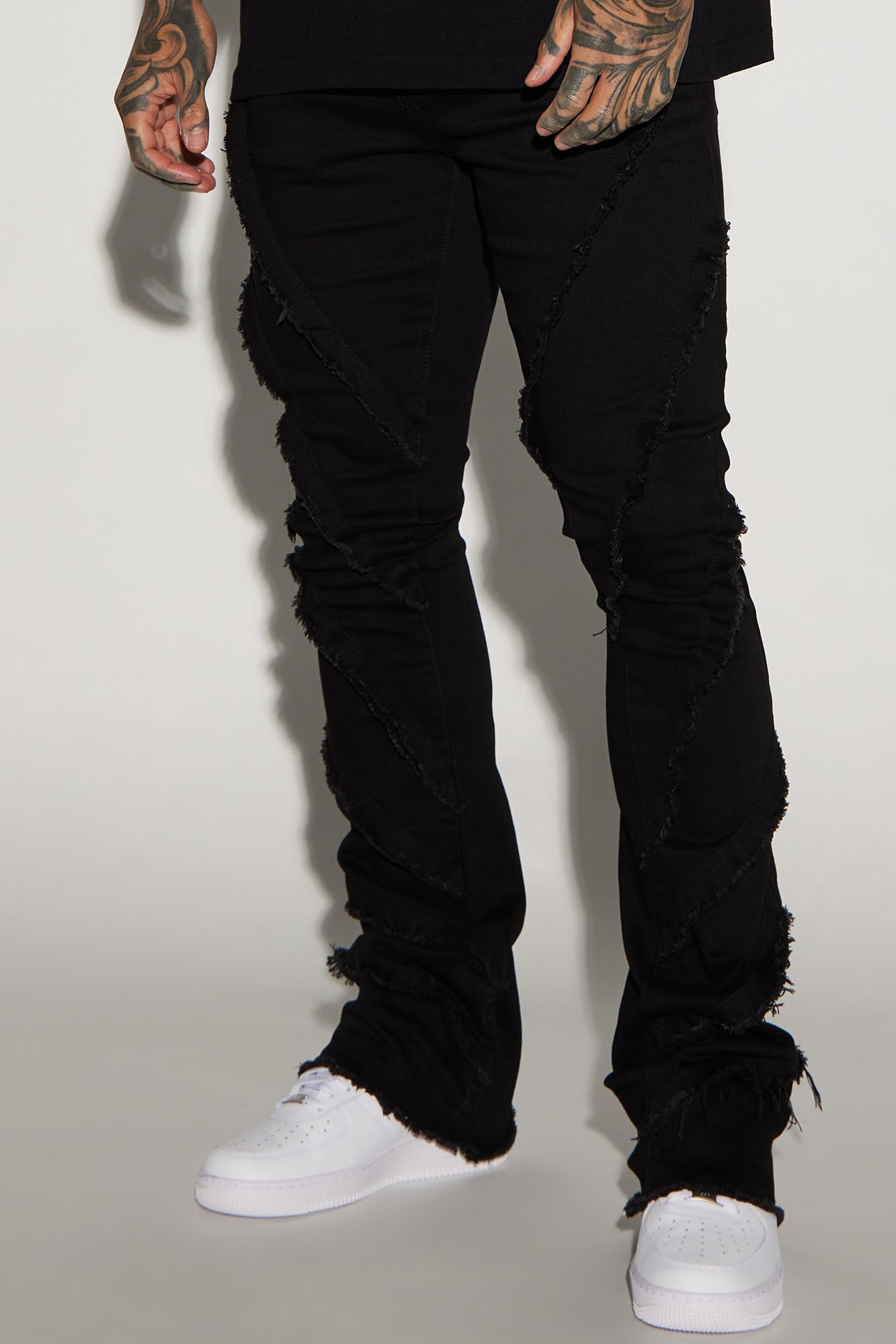 Slanted Fray Stacked Skinny Flare Jeans - Black image 1