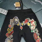 Evisu Kuro Denim Kitsune Daruma Sticker Collage M-Logo Graphic Jogger Sweatpants