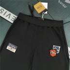 Evisu Kuro Sticker Patch Jogger Sweatpants — M-Seagull Shield & Polaroid Frame Front