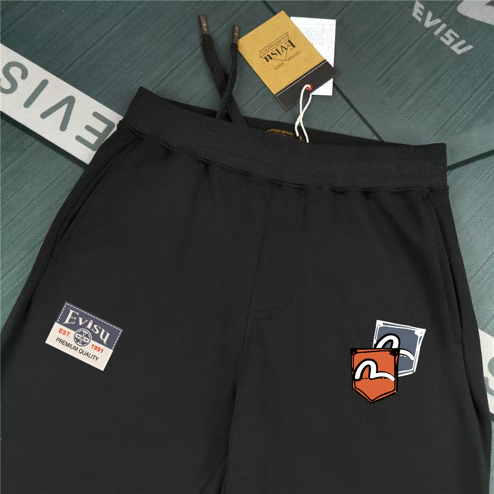 Evisu Kuro Sticker Patch Jogger Sweatpants — M-Seagull Shield & Polaroid Frame Front