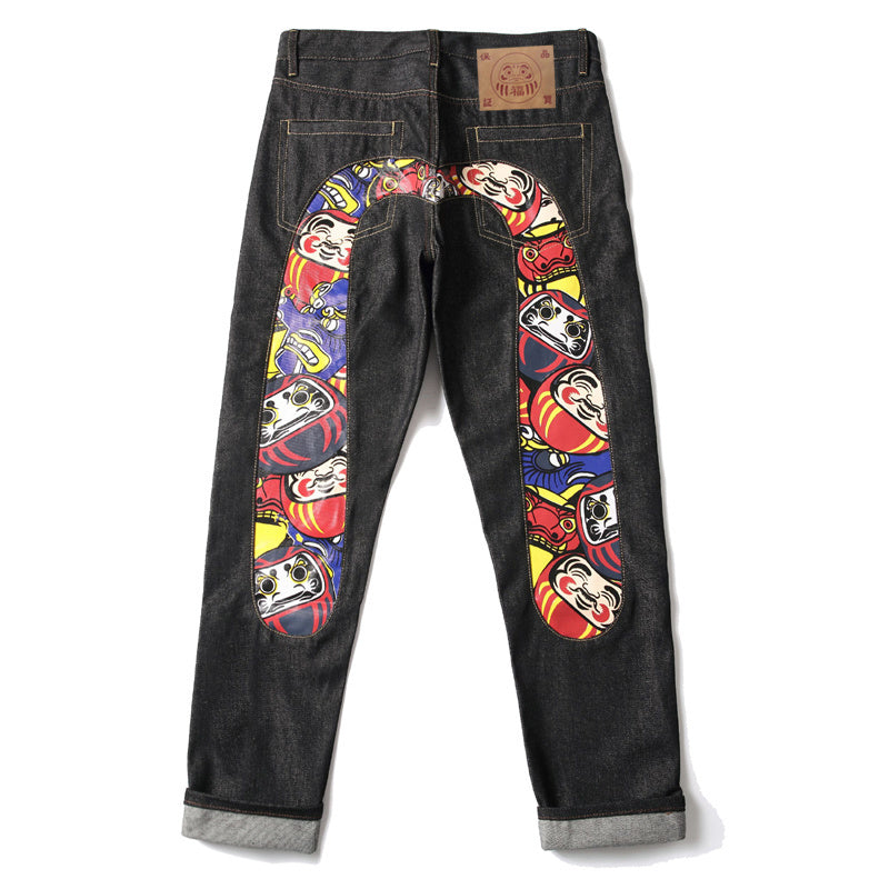 EVISU KURO Daicock Daruma Doll Print Appliqué Panel Jeans Wide Fit Raw Selvedge Dark Indigo