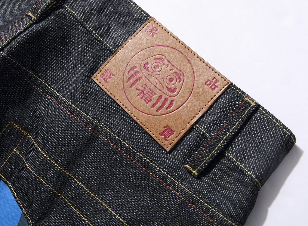 EVISU KURO Daicock Blue Yellow Camo Sakura Kamon Appliqué Panel Jeans Wide Fit Raw Selvedge Dark Indigo