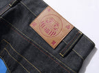 EVISU KURO Daicock Blue Yellow Camo Sakura Kamon Appliqué Panel Jeans Wide Fit Raw Selvedge Dark Indigo